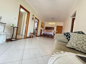 Pé na areia canto do forte V