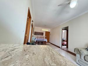 Pé na areia canto do forte V