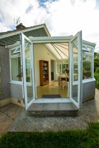 Light bungalow with a view of countryside and river