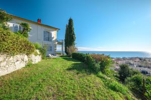 Villas Magnifique Villa d-epoque vue mer, plage a 12 min a pieds : photos des chambres