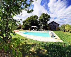 Appartements Gite avec piscine et jardin Le Cosy - Les Bergeronnettes Bergerac : photos des chambres