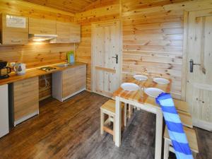 Single-story holiday homes with a terrace, pool