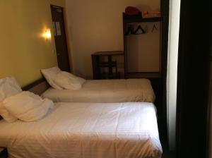 Hotels Hotel De La Place : photos des chambres
