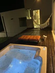 Refúgio com Spa Jacuzzi 40 min BH - 伊加拉佩