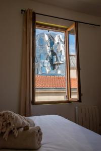 Maisons de vacances Ateliers, Terrasse - Parking - Clim : photos des chambres