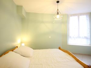 Appartements Bel F3 au 2eme etage, a 50m des Thermes, bien equipe, 6 couchages, ideal pour cures et vacances - FR-1-415-65 : photos des chambres