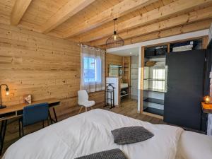 Maisons de vacances Chalet Nature avec Sauna et WIFI pres Gerardmer - FR-1-589-777 : photos des chambres