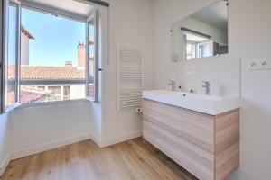 Appartements Apparts Limogeanne - Clim - Centre historique : photos des chambres