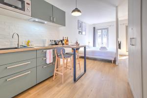 Appartements Apparts Limogeanne - Clim - Centre historique : photos des chambres
