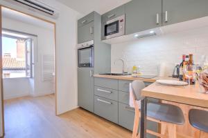 Appartements Apparts Limogeanne - Clim - Centre historique : photos des chambres