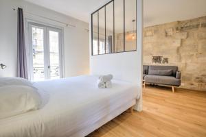 Appartements Apparts Limogeanne - Clim - Centre historique : photos des chambres