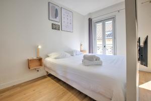 Appartements Apparts Limogeanne - Clim - Centre historique : photos des chambres