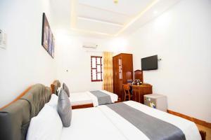 Phòng Đôi Tiêu Chuẩn Có 2 Giường Đôi (Standard Double Room with Two Double Beds)