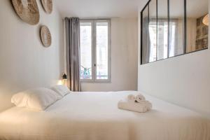 Appartements Apparts Limogeanne - Clim - Centre historique : photos des chambres