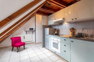 Appartements Logement atypique avec mezzanine : photos des chambres