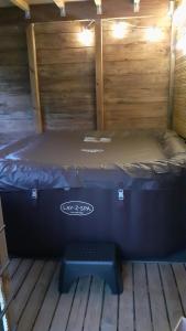 Chalets le Clos des Golferies, chalet avec jacuzzi : photos des chambres