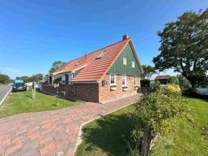 Ferienhaus Huus an`t Diek, Maisonette Wohnung in Deichnähe, Nähe Norddeich