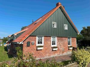 Ferienhaus Huus an`t Diek, Maisonette Wohnung in Deichnähe, Nähe Norddeich