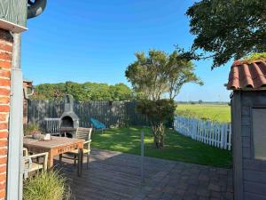 Ferienhaus Huus an`t Diek, Maisonette Wohnung in Deichnähe, Nähe Norddeich