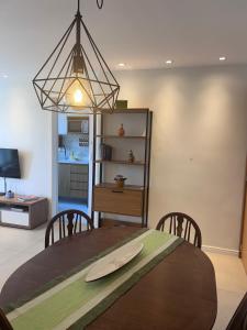 Apartamento Moderno na Praia com Home Office Ideal