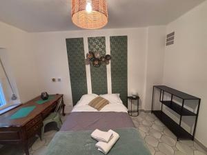 Appartements Chez Mamie Wifi Un Sejour a Part : photos des chambres