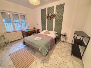 Appartements Chez Mamie Wifi Un Sejour a Part : photos des chambres