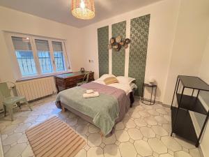 Appartements Chez Mamie Wifi Un Sejour a Part : photos des chambres