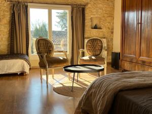 Maisons d'hotes La Maison Des Autres, piscine chauffee, chambres d'hotes proches Uzes, Nimes, Pont du Gard : photos des chambres