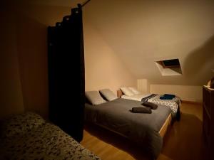Le Dortoir, logement avec 3 grands lits doubles