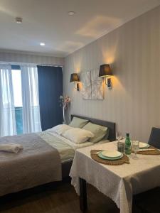 Апартаменты с обзорным видом на море и бульвар Orbi Beach Tower