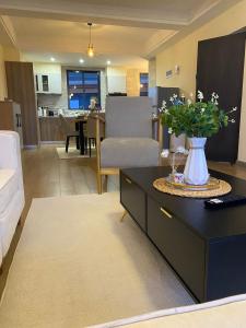 The comfort executive loft two bedroomed apartment with amazin breathtaking city views ,heated swimming pool,gym and rooftop chill spot with offers breathtaking city views ,private ample parking space with designated child playground area