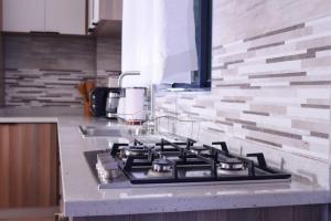 The comfort executive loft two bedroomed apartment with amazin breathtaking city views ,heated swimming pool,gym and rooftop chill spot with offers breathtaking city views ,private ample parking space with designated child playground area