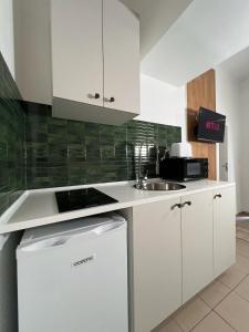 Appartements Joli petit duplex avec jacuzzi : photos des chambres