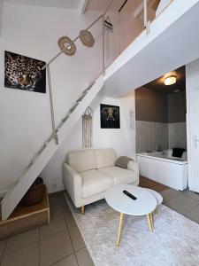 Appartements Joli petit duplex avec jacuzzi : photos des chambres