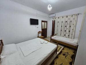 Deluxe Double Room (2 Adults + 1 Child) room in Bujtina Polimen