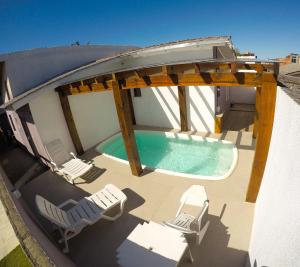 Residencial da Bia - Casas com 2 Dorms na Praia da Cal com Piscina Térmica