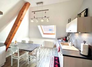 Appartements Le papillon,Logement cosy en Alsace : photos des chambres