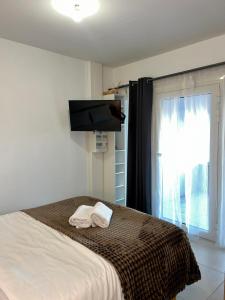 Studio neuf avec acces piscine