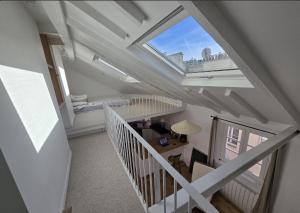 Studio duplex plein sud refait à neuf - paris 2ème - vue exceptionnelle toits