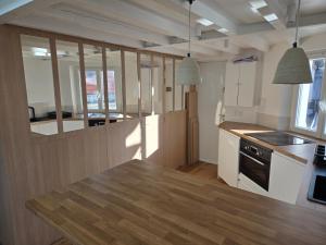 Studio duplex plein sud refait à neuf - paris 2ème - vue exceptionnelle toits