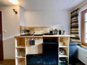 Appartements Le Grand Loup, appartement neuf avec bain nordique : photos des chambres