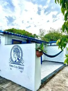 Hospedagem Casinha Grega na Praia da Baleia em Jacaraípe - 曼吉纽斯