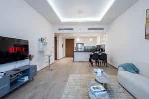 Luxe 1BR in Citywalk with Pool Balcony & More