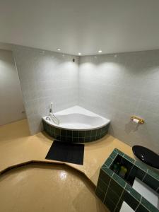 Appartements Charmant studio : photos des chambres