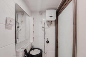 Nice and Cozy Studio at Sky House BSD Apartment By Travelio
