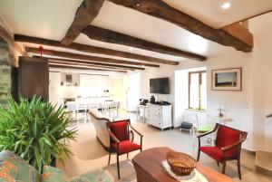 Villas Villa spacieuse a Vieillevie avec piscine privee - 180 m² : photos des chambres