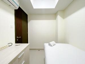 Well Furnished and Cozy 2BR Pollux Chadstone Apartment By Travelio