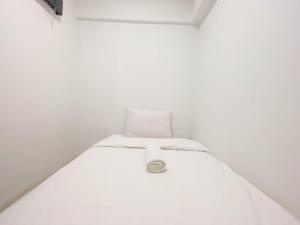 Simply 2BR at Jarrdin Cihampelas Apartment By Travelio