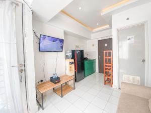 Simply 2BR at Jarrdin Cihampelas Apartment By Travelio