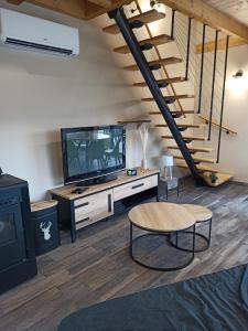 Chalets Chalet Le Nid Douillet avec jacuzzi et sauna privatifs : photos des chambres